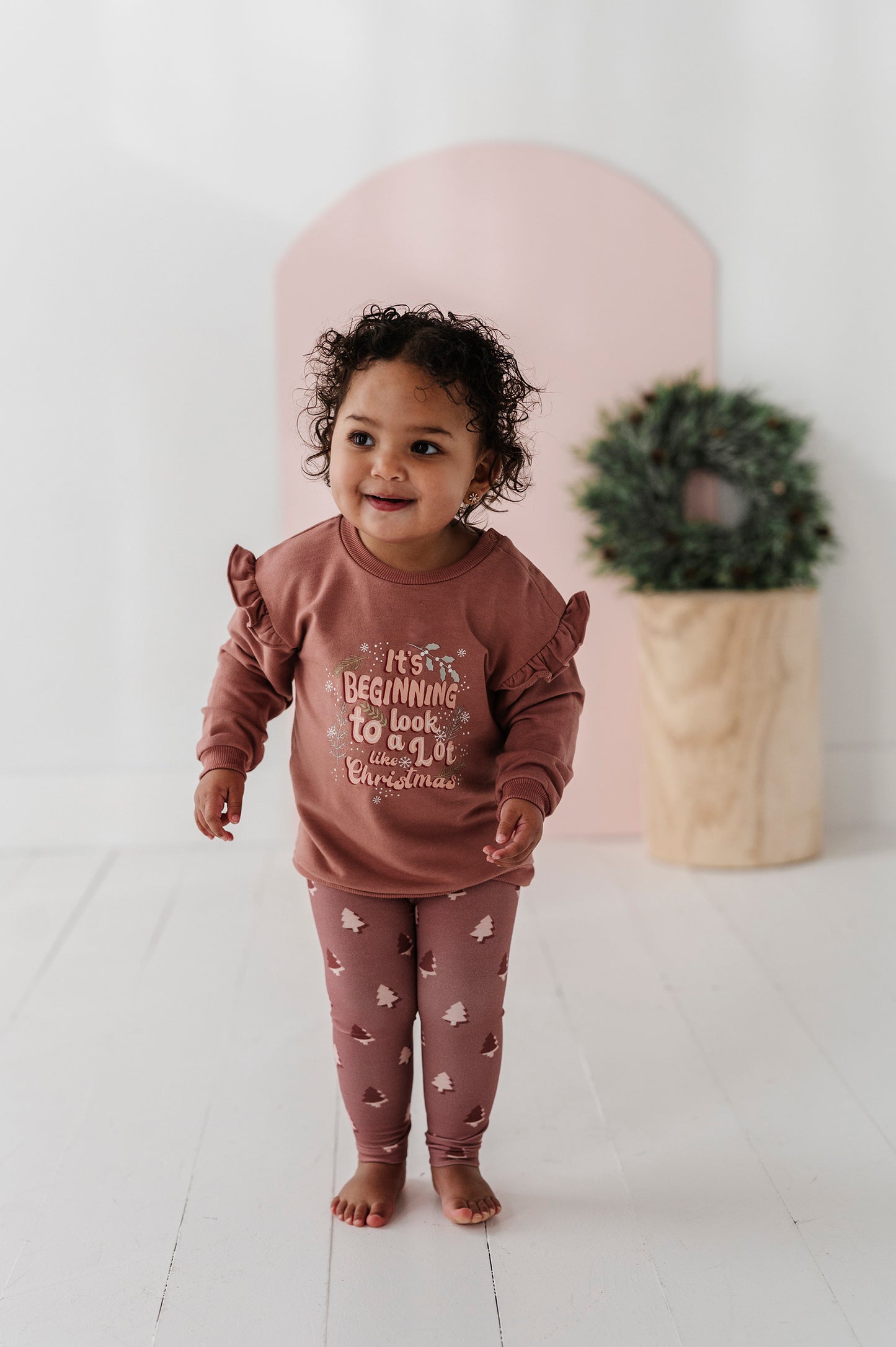 IT'S BEGINNING TO LOOK A LOT LIKE CHRISTMAS RUFFLE SWEATSHIRT