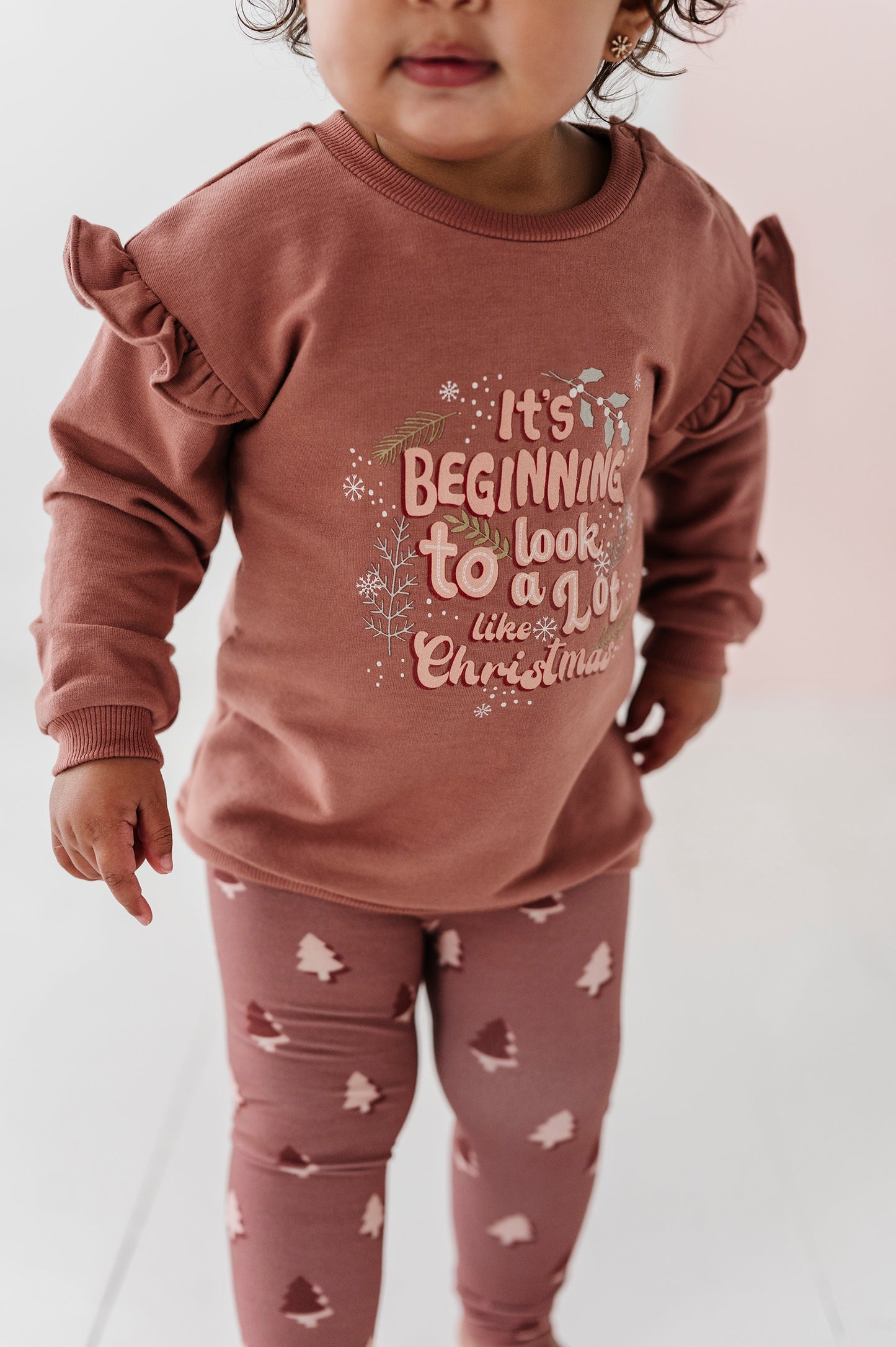 IT'S BEGINNING TO LOOK A LOT LIKE CHRISTMAS RUFFLE SWEATSHIRT